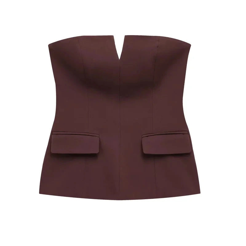 Strapless off-white crop top with backless design and corset silhouette, made from lightweight polyester.