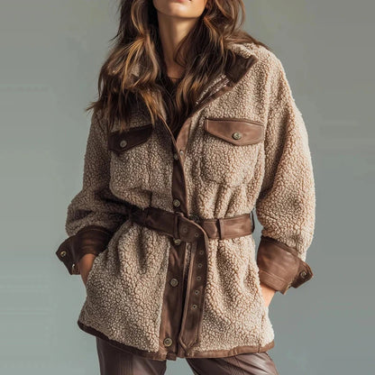 Elegant long sleeve leather coat with button closure and pockets, ideal for autumn and winter layering.