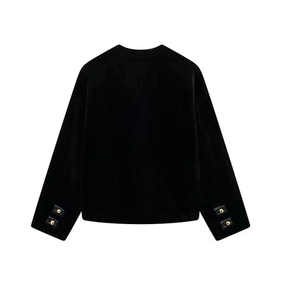 Black polyester jacket with minimal design and regular fit, featuring a zip closure and side pockets.