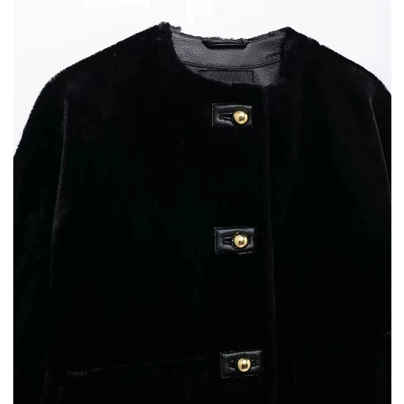 Black polyester jacket with regular fit and minimal design, featuring zip closure and side pockets.