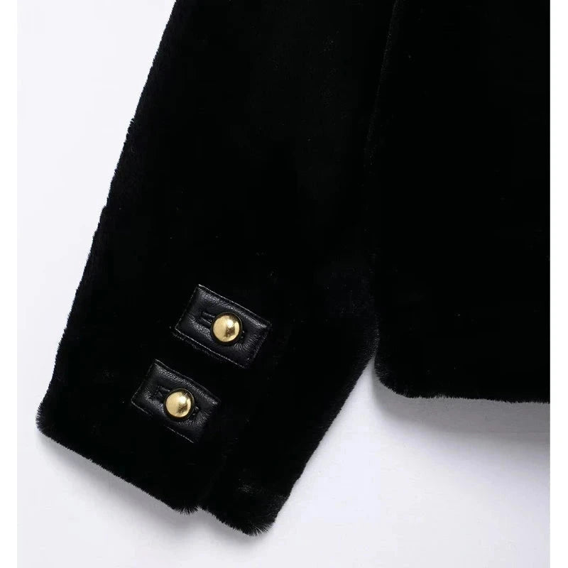 Black polyester jacket with minimal design and regular fit, featuring zip closure and side pockets.