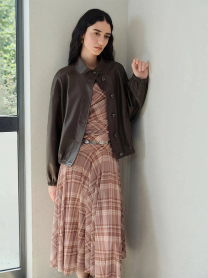 Brown stand collar leather jacket with single-breasted closure and loose fit, ideal for casual wear.