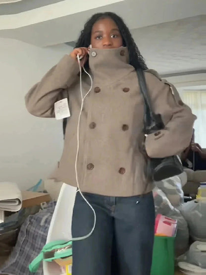 Chic stand collar wool blend coat with zipper closure and pockets, ideal for autumn and winter layering.