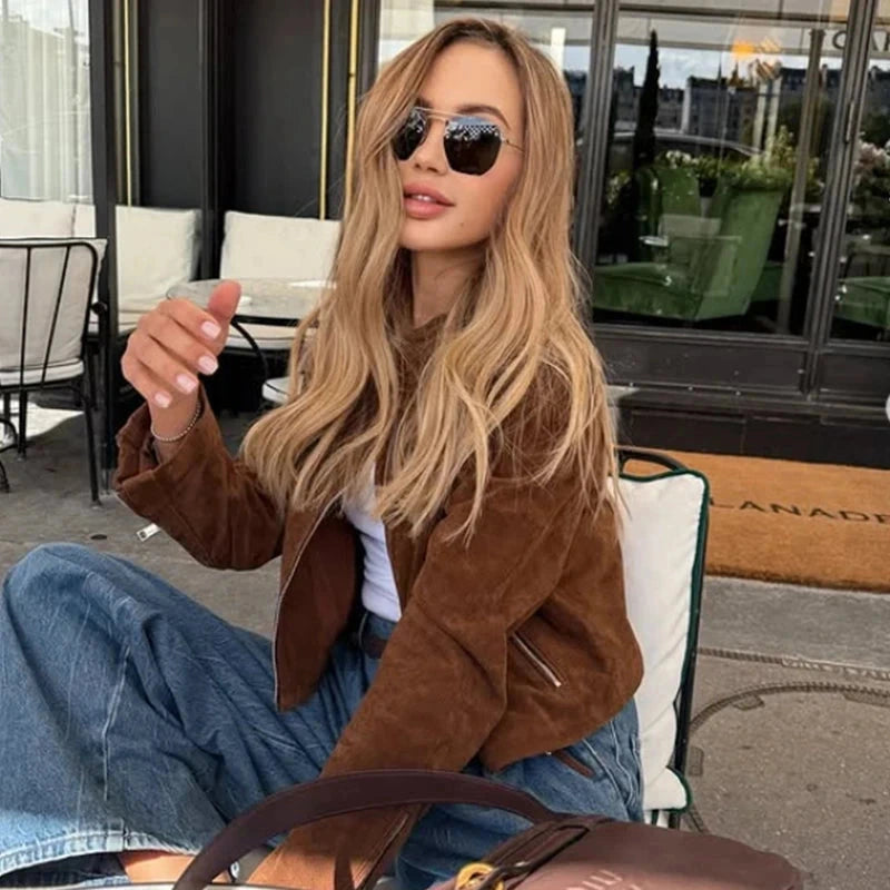 Cropped suede jacket with zipper closure, crafted from polyester, designed for a regular fit and contemporary style.