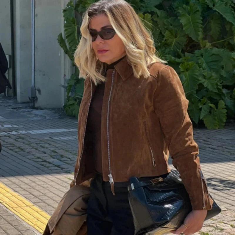 Cropped suede jacket with zipper closure, crafted from polyester, designed for a regular fit and contemporary layering.