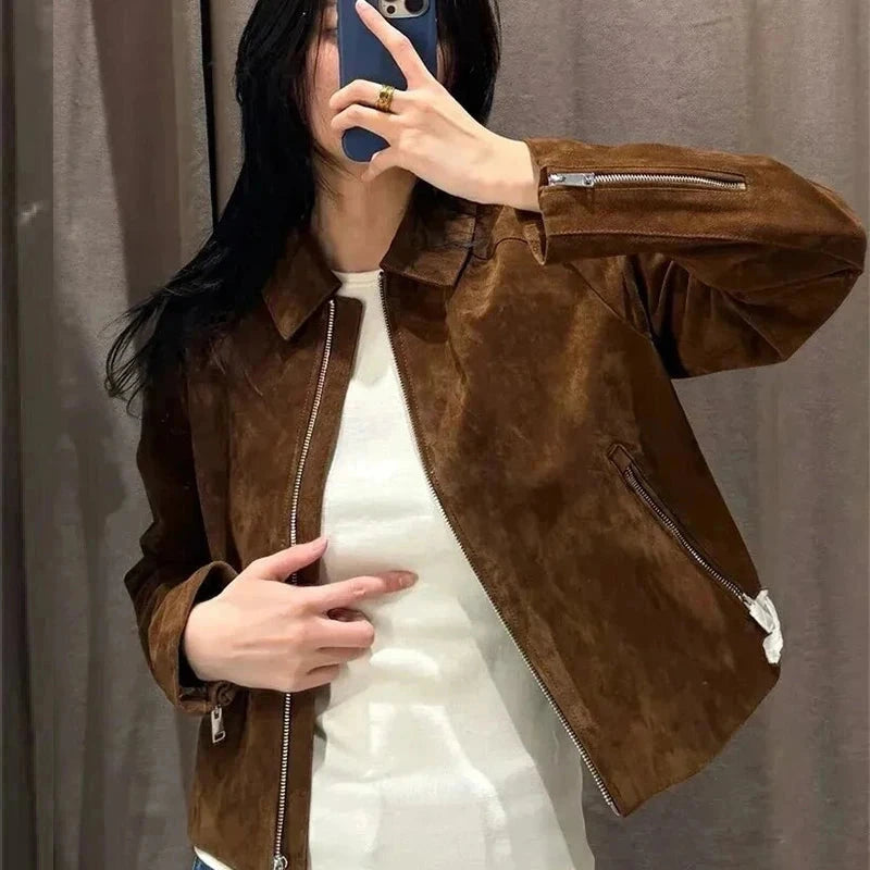 Cropped suede jacket with zipper closure, crafted from polyester, designed for a regular fit and layering.