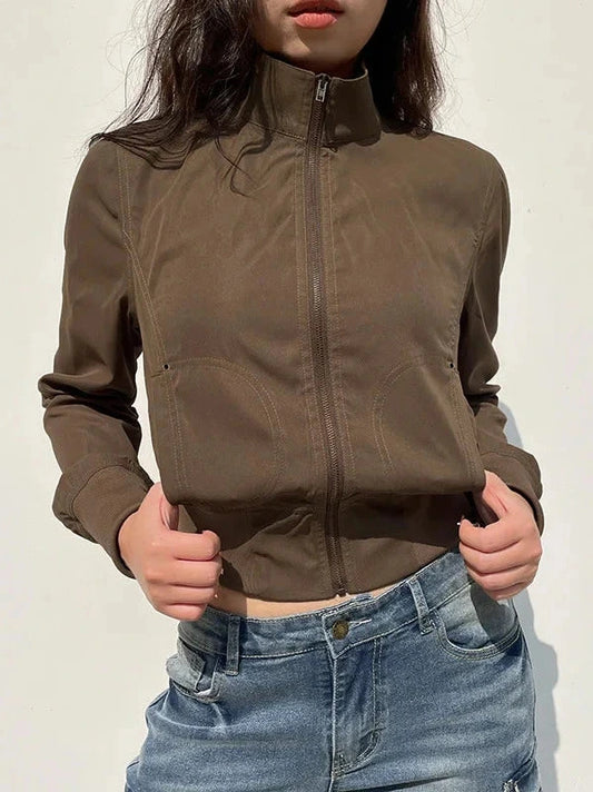 Cropped zipper jacket in polyester with a slim fit, designed for modern layering and a contemporary look.