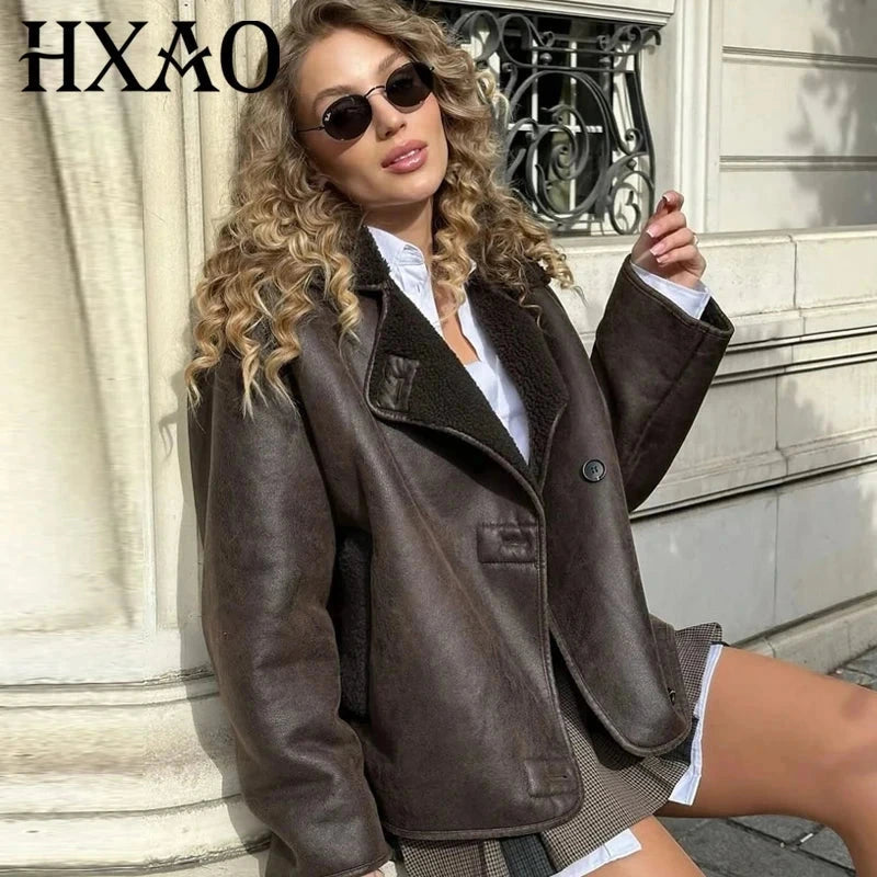 Chic faux leather fur crop jacket with button closure and pockets, designed for casual outings and a loose fit.