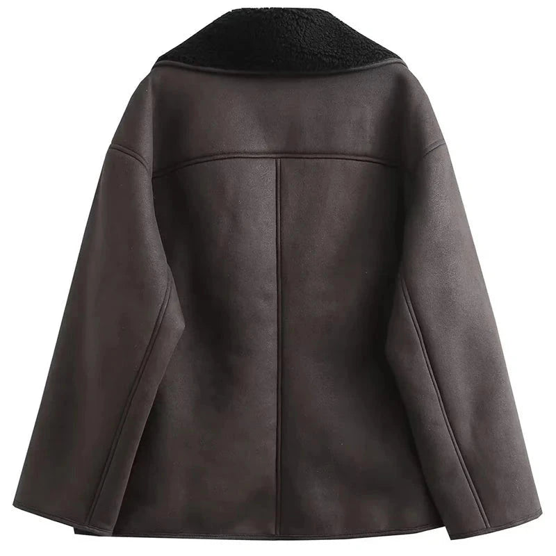 Chic faux leather fur crop jacket with button closure and pockets, designed for casual outings and a loose fit.