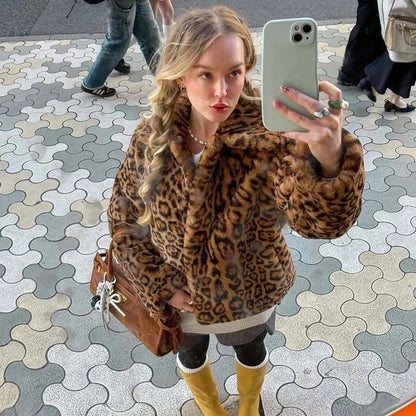 Elegant faux leather fur plush coat with covered button closure, designed for evening wear and night outings.