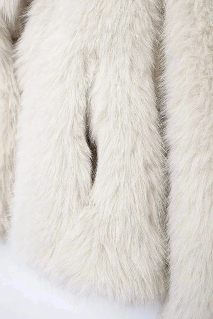 Chic faux leather fur short coat designed for warmth and comfort, perfect for casual outings. Regular fit and thick cozy mate