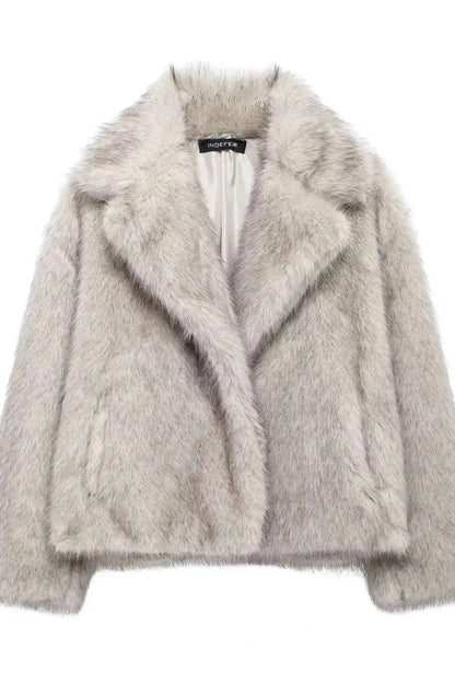 Light grey faux leather fur short coat with a thick and cozy design for casual outings. Regular fit for comfort.