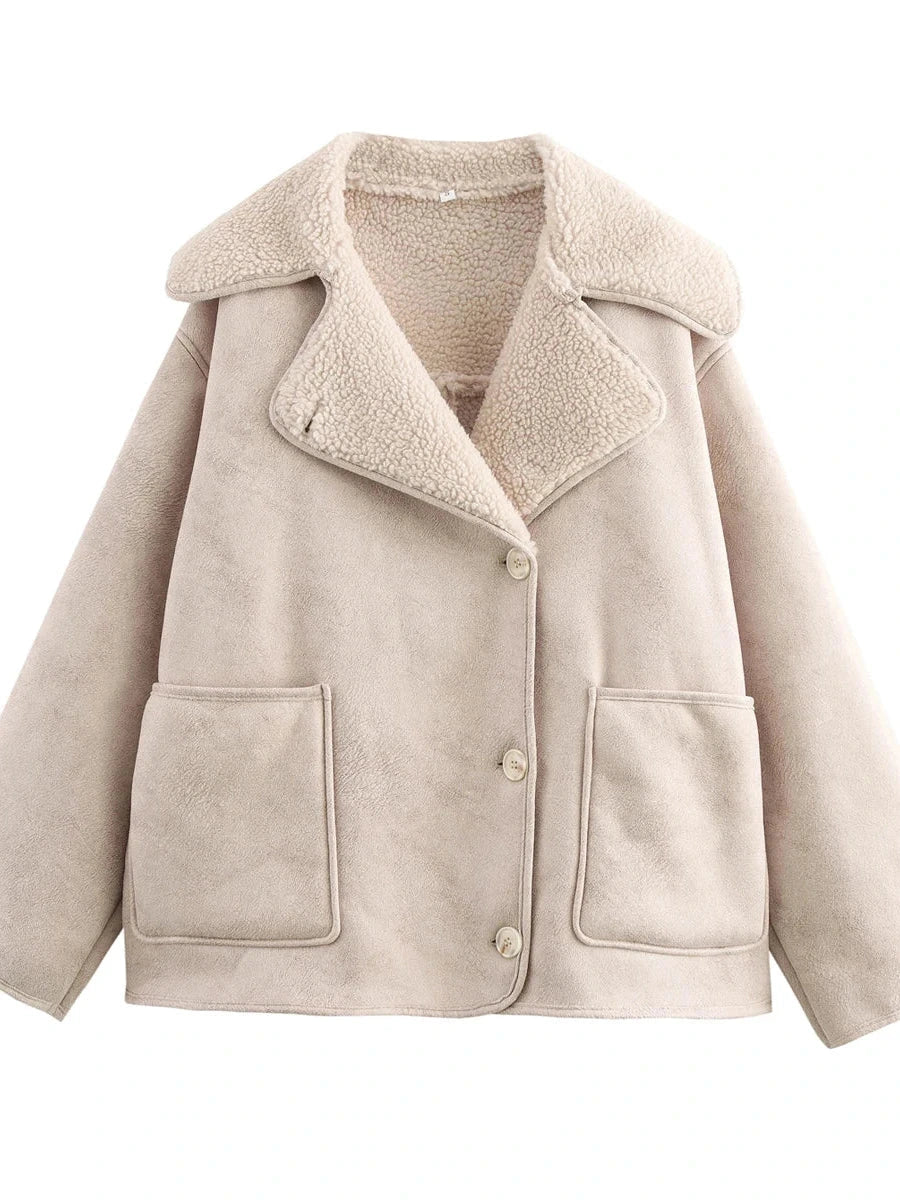 Soft beige vintage-inspired faux leather fur jacket with pockets and loose fit. Ideal for autumn layering.
