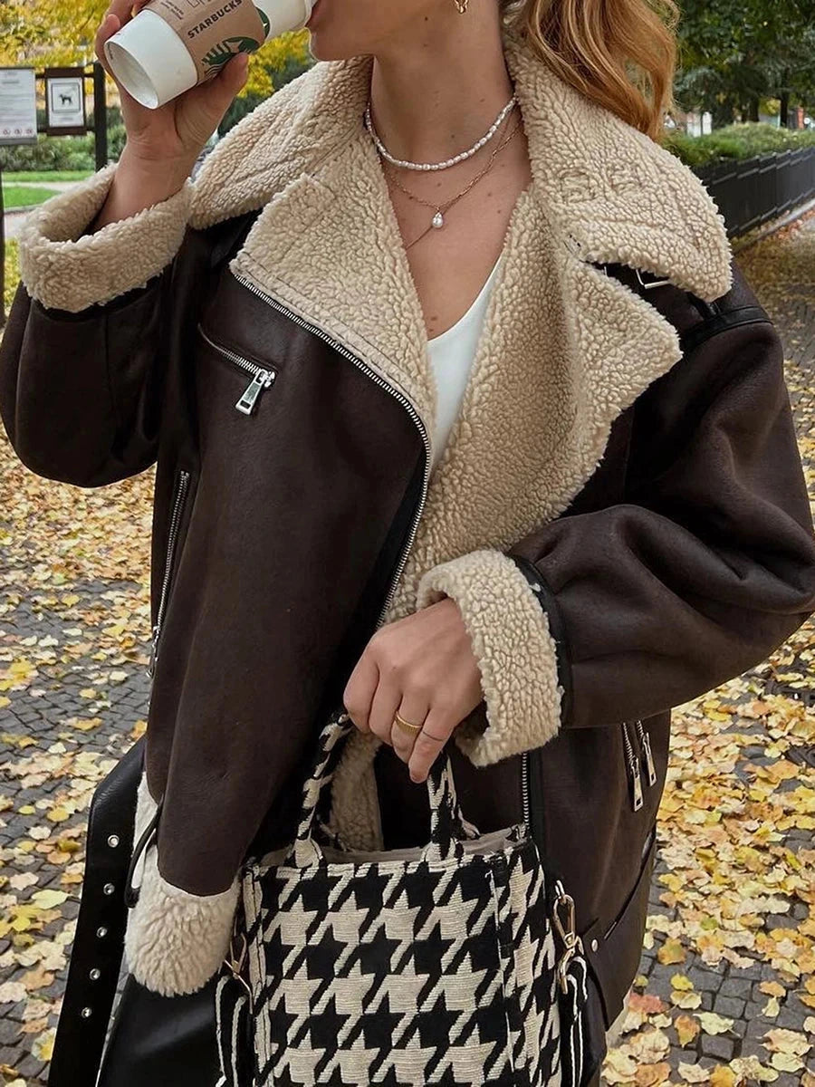 Brown polyester jacket with minimal design and regular fit silhouette.