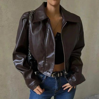 Chic oversized faux leather jacket with a turn-down collar and loose fit, ideal for autumn and winter layering.