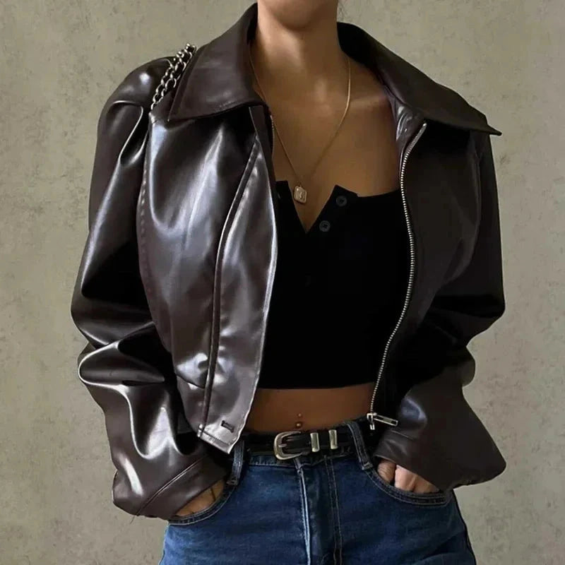 Chic oversized faux leather jacket with a turn-down collar and loose fit, ideal for autumn and winter layering.