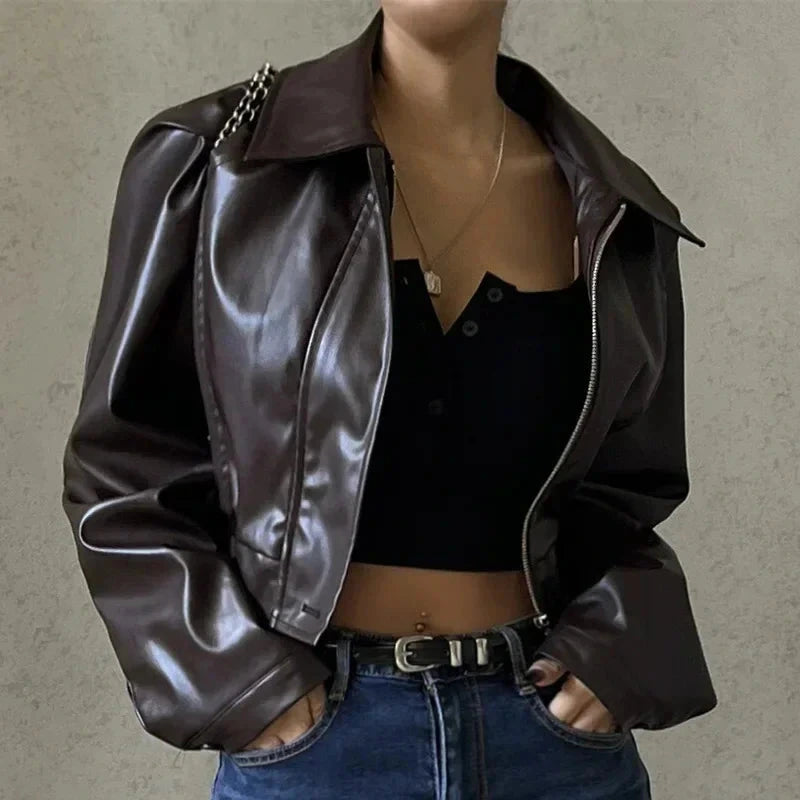 Chic oversized faux leather jacket with a turn-down collar and loose fit, ideal for autumn and winter layering.