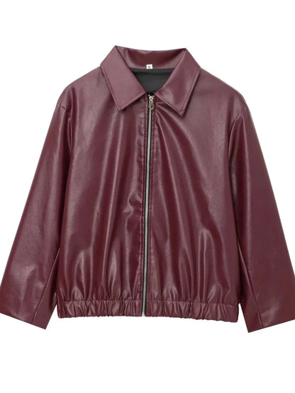 Wine red faux leather zipper jacket with regular fit and sleek silhouette, ideal for casual and urban style.