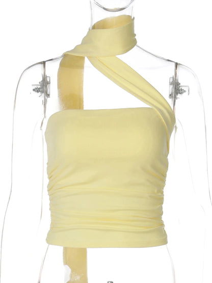 Halter ruched crop top with backless design and slight stretch for comfort. Ideal for casual outings and parties.
