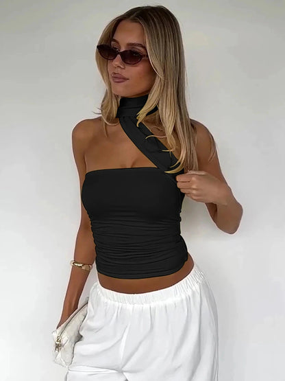 Halter ruched crop top with backless design and slight stretch for comfort. Ideal for casual outings and parties.