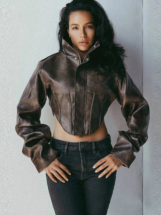 Irregular cut crop jacket with zipper closure, made from a polyester and spandex blend, slim fit design.