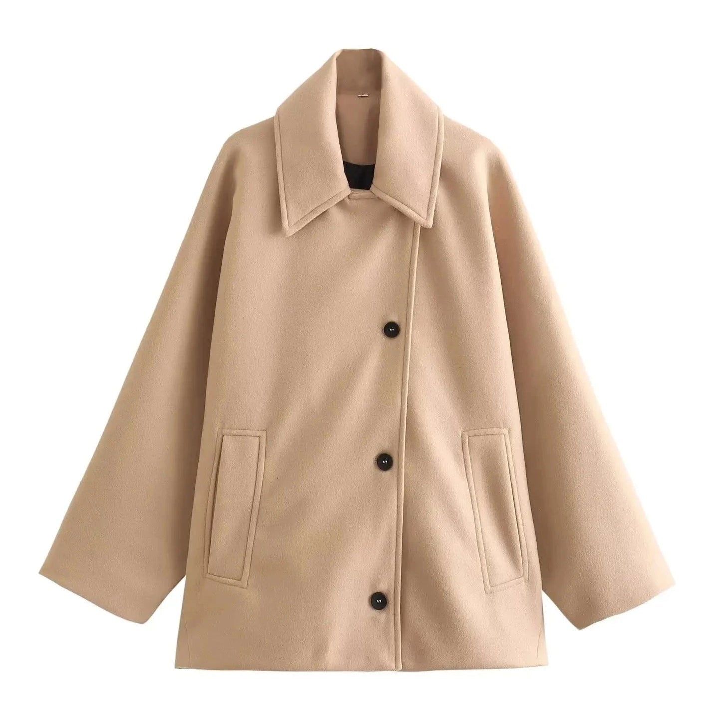 Chic oversized long jacket in soft beige with single-breasted design and practical pockets. Ideal for layering.