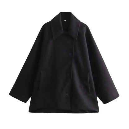 Chic oversized long jacket in midnight black with a loose fit, single-breasted design, and practical pockets.