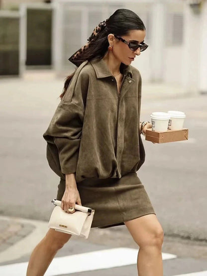 Chic oversized bomber jacket made from polyester with zipper closure and pockets, suitable for casual wear or parties.