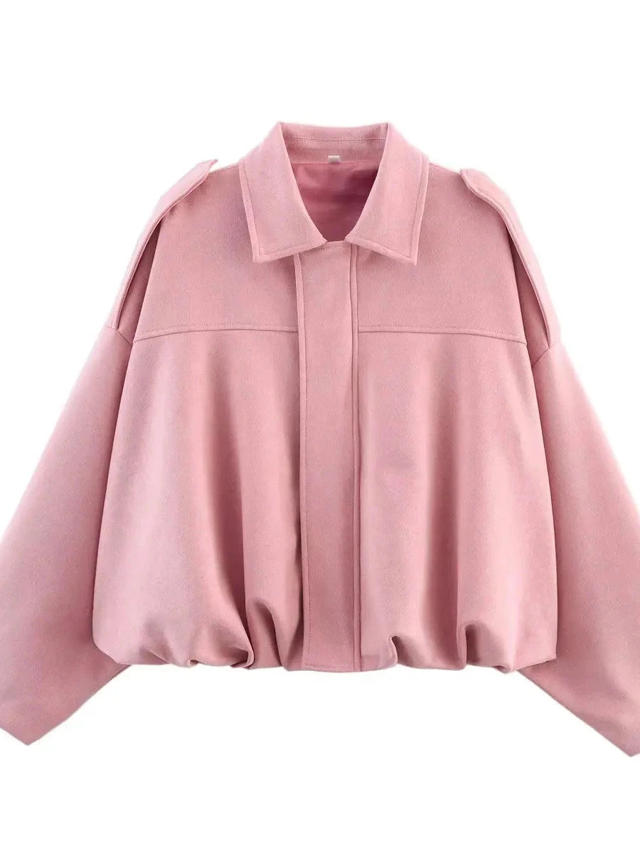 Chic oversized bomber jacket in blush pink with zipper closure and pockets, made from premium polyester.