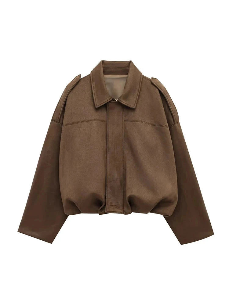 Chocolate brown oversized bomber jacket with zipper closure and pockets, made from polyester material.