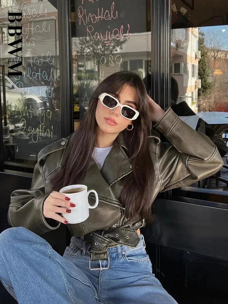 Chic oversized faux leather jacket with a zipper closure and modern silhouette for casual streetwear.