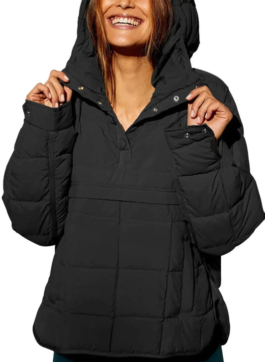 Cozy oversized puffer jacket with a hood, designed for casual layering and comfort. Made from lightweight polyester and spand