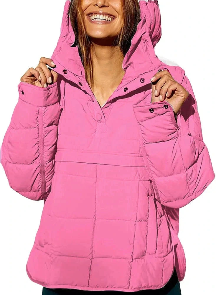 Bright pink cozy oversized puffer jacket with a hood, designed for casual layering and comfort.