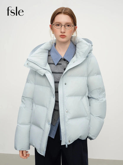 Contemporary short hooded puffer jacket with bat sleeves and duck down filling for warmth and comfort.