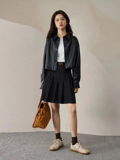 Chic short leather jacket with single breasted closure, crafted from premium PU leather, ideal for casual outings.