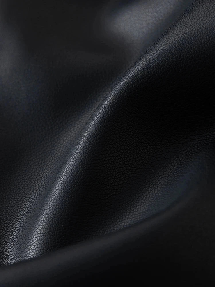 Chic short leather jacket with single breasted closure, crafted from premium PU leather, ideal for casual outings.