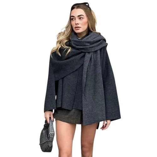 Asymmetric plush jacket with covered button closure and loose fit, crafted from soft polyester.