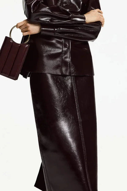Refined leather jacket and mini skirt ensemble with single-breasted closure and turn-down collar, made from polyester.