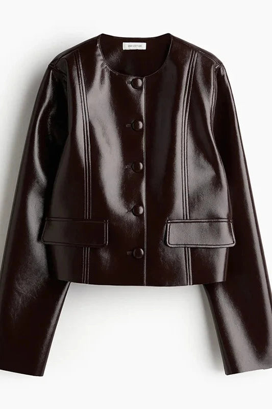 Refined leather jacket and mini skirt ensemble in espresso brown, featuring a single-breasted closure and turn-down collar.