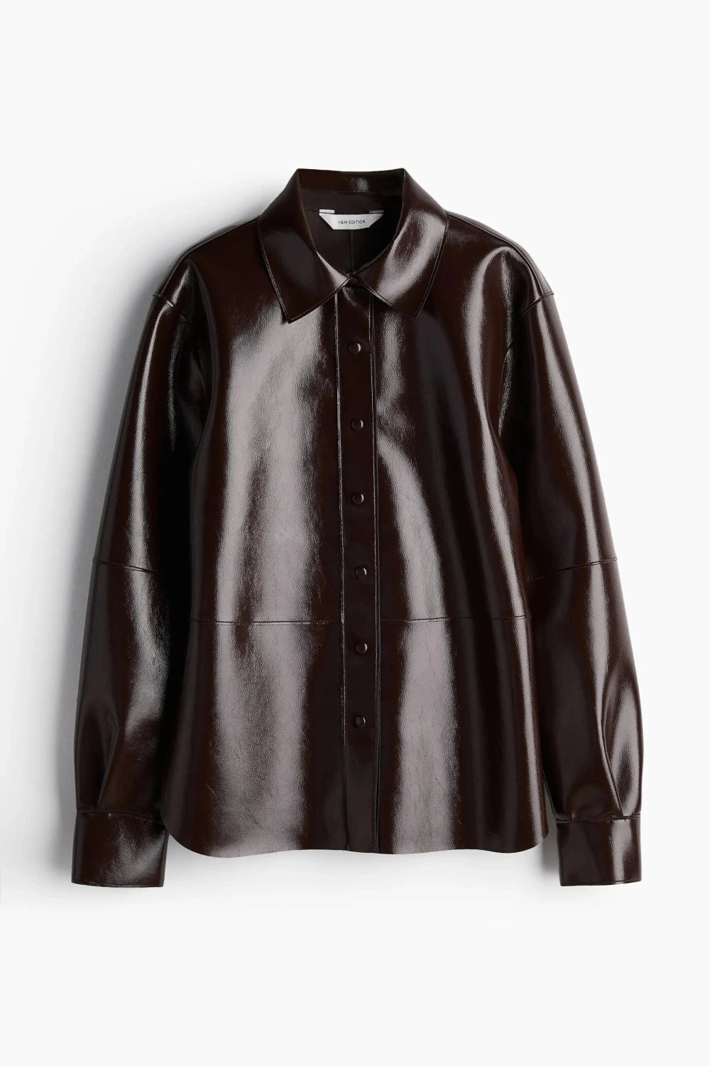 Refined leather jacket and mini skirt ensemble in espresso brown, featuring a single-breasted closure and turn-down collar.