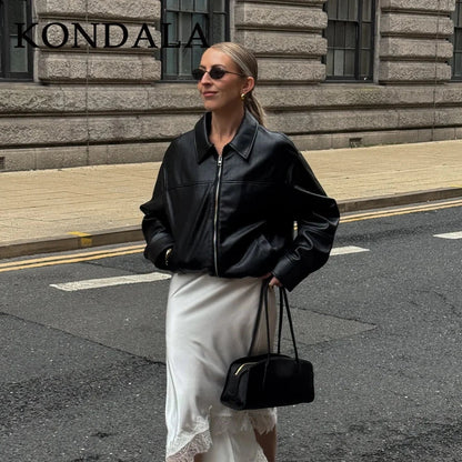 Chic vintage spliced zipper faux leather jacket with turn-down collar and full sleeves in regular fit.