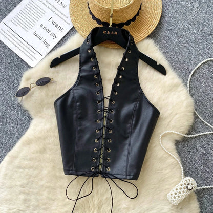 Chic black PU leather crop top with rope straps and hollow-out design, featuring a fitted silhouette and super-short length.