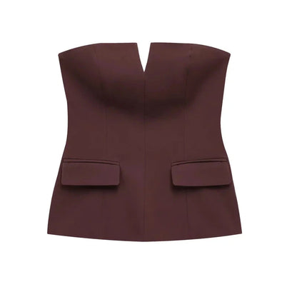 Strapless off-white crop top with backless design and corset silhouette, made from lightweight polyester.