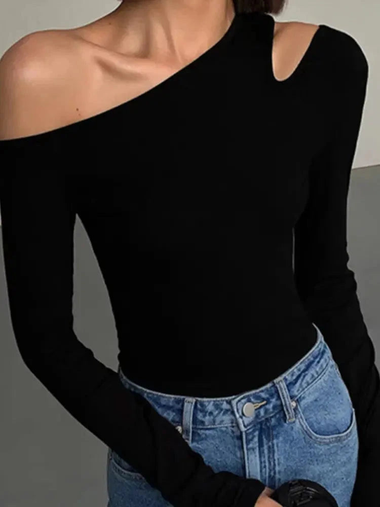 Refined off-shoulder long-sleeved crop top with skew collar and flare sleeves in a slim fit. Ideal for casual wear.
