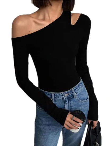 Refined off-shoulder long-sleeved crop top with skew collar and flare sleeves in a slim fit.
