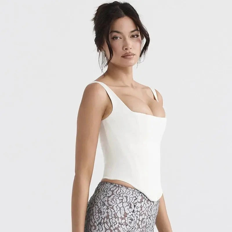 Backless halter neck stretch bandage top made from a polyester and spandex blend, featuring a super-short length.