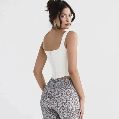 Backless halter neck stretch bandage top made from a polyester and spandex blend, designed for a sleek silhouette.