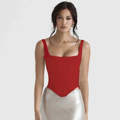 Bright red backless halter neck stretch bandage top made from a polyester and spandex blend. Super-short length.