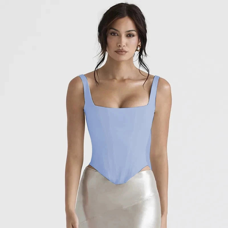 Sky blue backless halter neck stretch bandage top made from a polyester and spandex blend. Super-short length.