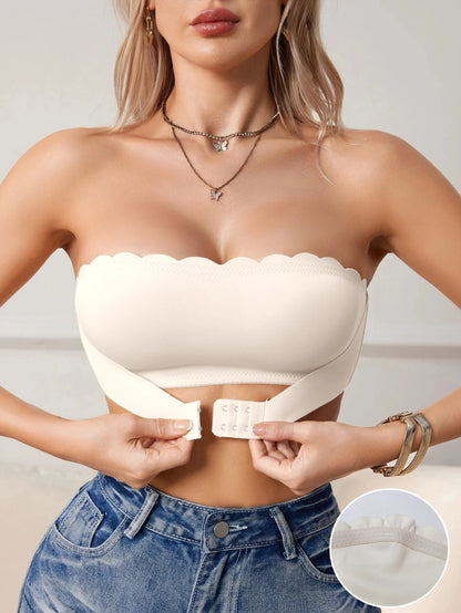 Cream white strapless push-up bandeau bra with seamless design and front closure, made from soft polyamide.